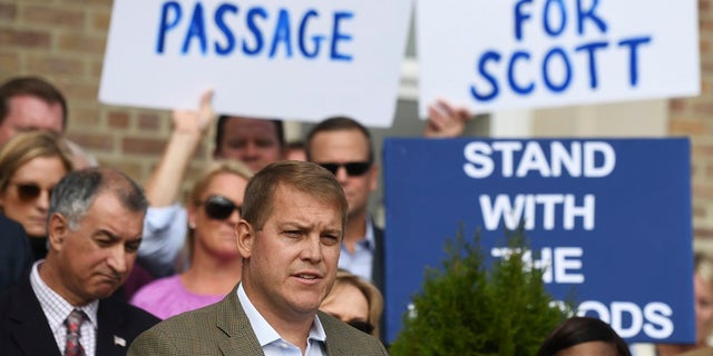 Scott Hapgood speaks at the Town Hall in Darien, Conn., on Monday as U.S. Sen. Richard Blumenthal, D-Conn., and the town show support for him. (Tyler Sizemore/Hearst Connecticut Media via AP)