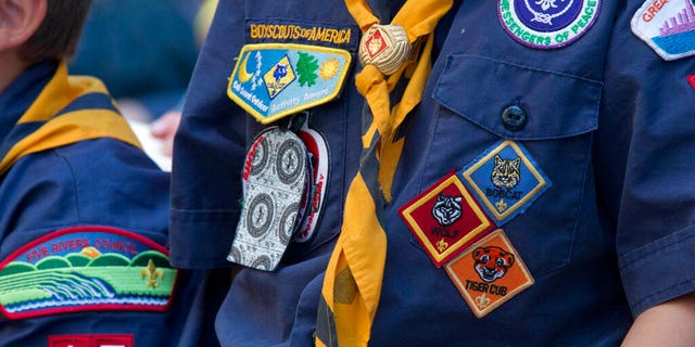 FILE: Cub Scouts watch a race during the Second Annual World Championship Pinewood Derby in New York's Times Square.