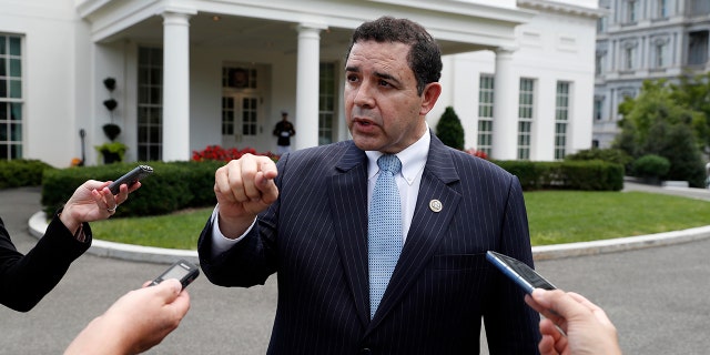 Rep. Henry Cuellar, D-Texas, speaks with the media in front of the West Wing after a bipartisan meeting with President Donald Trump at the White House, Wednesday, Sept. 13, 2017, in Washington. Cuellar is facing a primary challenge from the left by Cisneros.