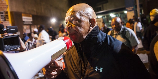 Rep. Elijah Cummings pleading for protestors to go home at curfew rather than risk arrest in Baltimore, on April 29, 2015. (Samuel Corum/Anadolu Agency/Getty Images, File)