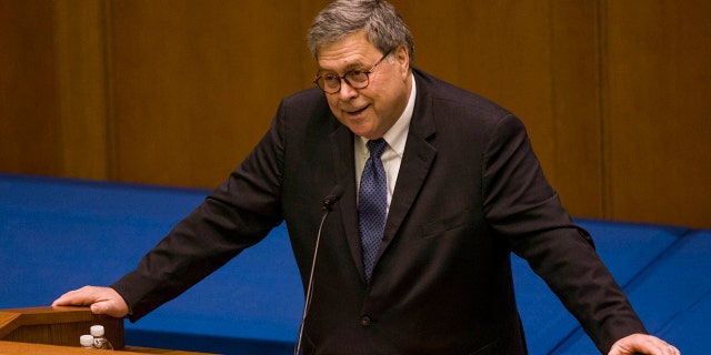United States Attorney General William P. Barr speaks to Notre Dame Law School students and faculty on Friday, Oct. 11, 2019, inside Notre Dame's Eck Hall of Law in South Bend, Ind. (Robert Franklin/South Bend Tribune via AP)