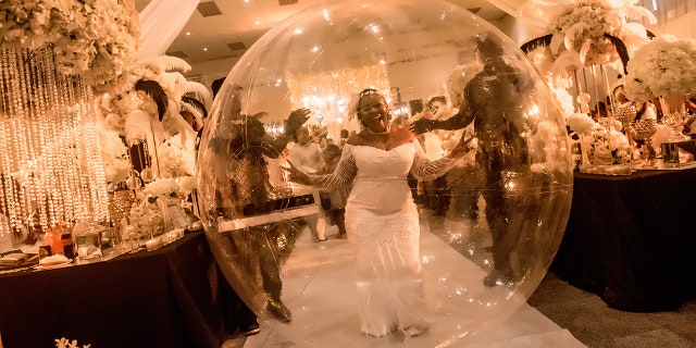One woman in Nigeria recently shocked guests as she rolled into her tenth wedding anniversary party in a giant, clear, bubble-style balloon.
