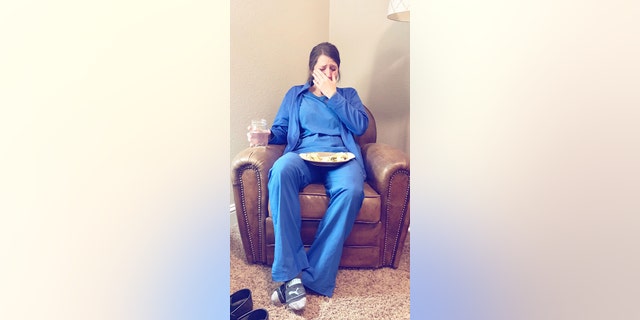 The photo was snapped by Caty Nixon's sister, Laura McIntyre, and shared nearly 100,000 times on Facebook.