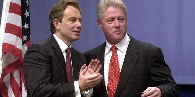 President Bill Clinton British Prime Minister Tony Blair at Warwick University in December 2000. (BRIAN BOULD/AFP/Getty Images, File)