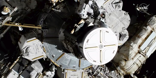 In this photo provided by NASA astronauts Christina Koch and Jessica Meir exits the International Space Station on Friday, Oct. 18, 2019.