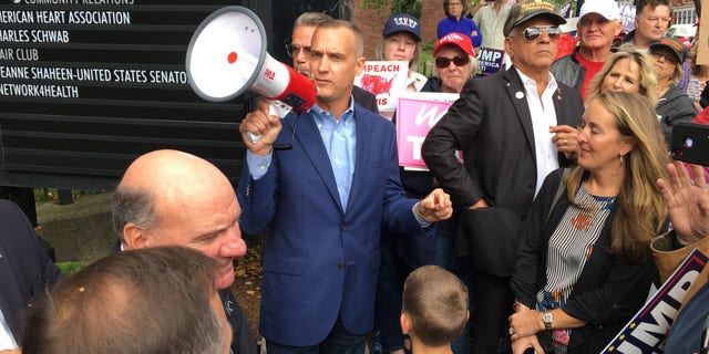 Corey Lewandowski headlines a Trump re-election campaign and Republican National Committee anti-impeachment rally on Oct. 7, 2019 in Manchester, N.H., outside the offices of Democratic Sen. Jeanne Shaheen.