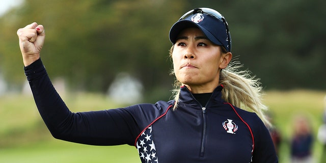 Danielle Kang of Team USA celebrates her putt on the thirteenth green in her match against Carlota Ciganda of Team Europe during the final day singles matches of the Solheim Cup at Gleneagles on September 15, 2019 in Auchterarder, Scotland. (Photo by Jamie Squire/Getty Images)
