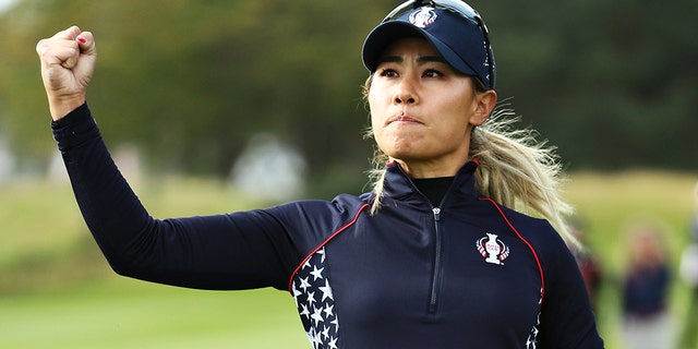 Danielle Kang of Team USA celebrates her putt on the thirteenth green in her match against Carlota Ciganda of Team Europe during the final day singles matches of the Solheim Cup at Gleneagles on September 15, 2019 in Auchterarder, Scotland. (Photo by Jamie Squire/Getty Images)