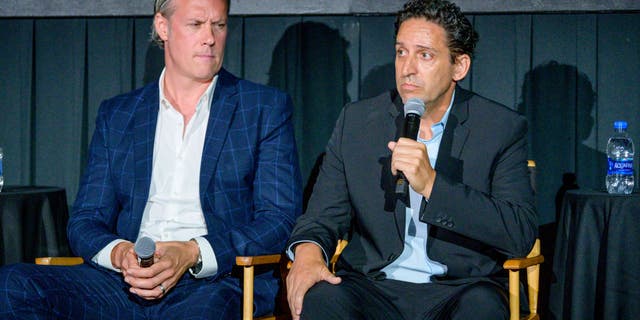Paul Pawlowski and David Check attend the