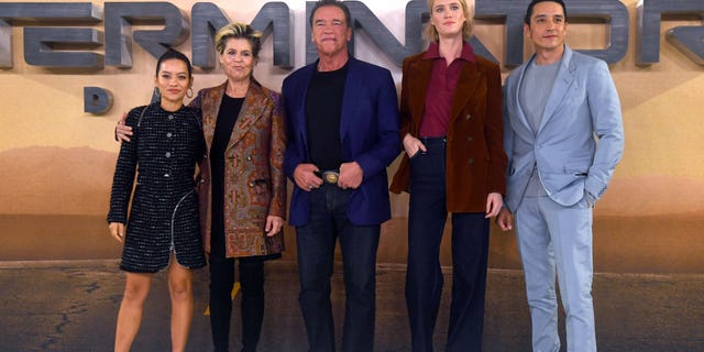 From l-r: Natalia Reyes, Linda Hamilton, Arnold Schwarzenegger, Mackenzie Davis and Gabriel Luna attend the 'Terminator: Dark Fate' photocall on October 17, 2019 in London, England.