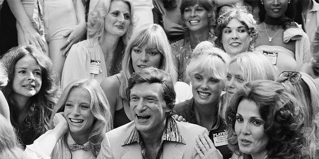 Stratten joins a bevy of Playmates surrounding founder Hugh Hefner at a 1979 party celebrating Playboy's 25th anniversary in Los Angeles.