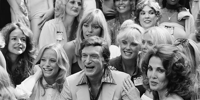 Stratten joins a bevy of Playmates surrounding founder Hugh Hefner at a 1979 party celebrating Playboy's 25th anniversary in Los Angeles.