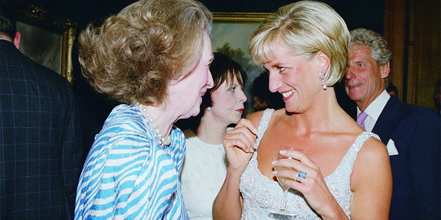Diana, Princess of Wales at a private viewing and reception at Christie's in aid of the Aid Crisis Trust and The Royal Marsden Hospital Cancer Fund, Diana is with her step-mother Raine, Comtesse De Chambrun (formerly Countess Raine Spencer), Diana is wearing a dress by Catherine Walker.