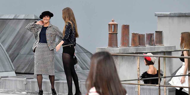 Gigi Hadid Confronts Runway Crasher At Chanel Paris Fashion