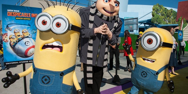 Gru and his Minions in 2014 at Universal Studios Hollywood in Universal City, Calif. A Universal Orlando actor who played the animated villain has just been fired for allegedly making a racist hand gesture while taking a photo with a young biracial girl earlier this year. (Photo by Valerie Macon/Getty Images)