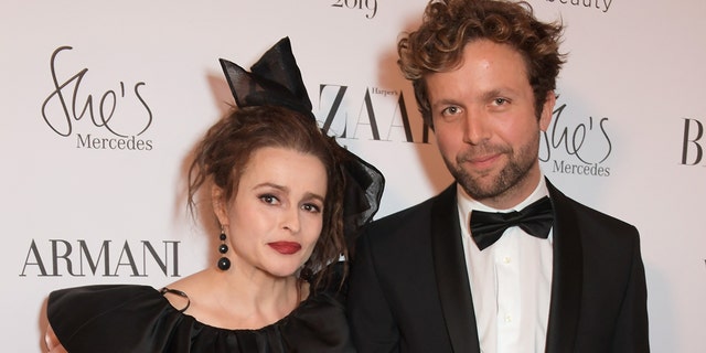 Helena Bonham Carter and Rye Dag Holmboed. (Photo by David M. Benett/Dave Benett/Getty Images for Harper's Bazaar)