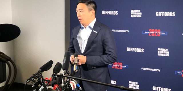 2020 Presidential candidate Andrew Yang speaks to reporters during a gun violence forum in Las Vegas, Nevada.
