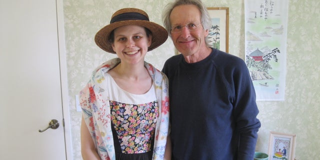 Amanda Johnson, pictured with dad Larry, started getting headaches, which was out of the norm for her.