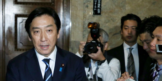 Japan's Trade Minister Isshu Sugawara speaks to the media at the parliament in Tokyo on Oct. 25, 2019.