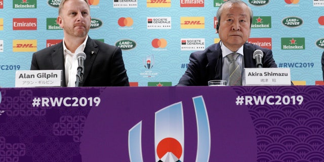 Alan Gilpin, left, tournament director for the 2019 Rugby World Cup and Japan Rugby 2019 CEO Akira Shimazu, right, attend during a press briefing on update relating to the anticipated impact of Typhoon Hagibis.