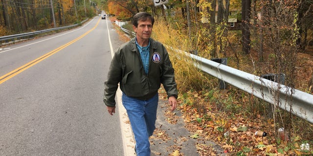 Retired admiral and former congressman Joe Sestak of Pennsylvania - a very long-shot contender for the Democratic presidential nomination, walks across the width of New Hampshire, in Manchester, NH on Oct. 18, 2019