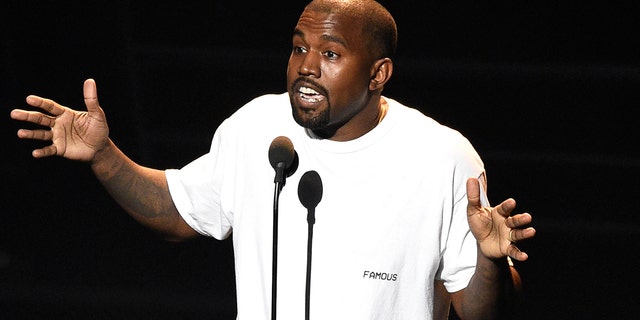 Kanye West appears at the MTV Video Music Awards at Madison Square Garden in New York. West held an outdoor worship service that attracted thousands to the Wyoming city where he owns a ranch.