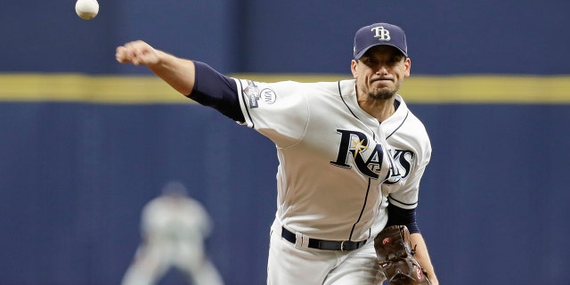 Tampa Bay Rays starting pitcher Charlie Morton (50) throws during the first inning of Game 3 of a baseball American League Division Series against the Houston Astros, Monday, Oct. 7, 2019, in St. Petersburg, Fla. (AP Photo/Chris O'Meara, Pool)
