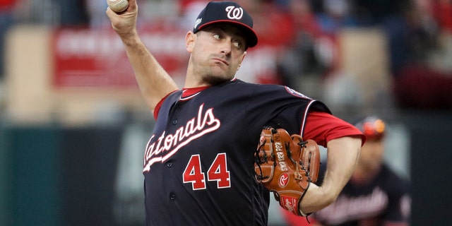 Washington Nationals relief pitcher Daniel Hudson throws during the ninth inning of Game 2 of the baseball National League Championship Series against the St. Louis Cardinals Saturday, Oct. 12, 2019, in St. Louis. The Nationals won 3-1 to take a 2-0 lead in the series. (AP Photo/Mark Humphrey)