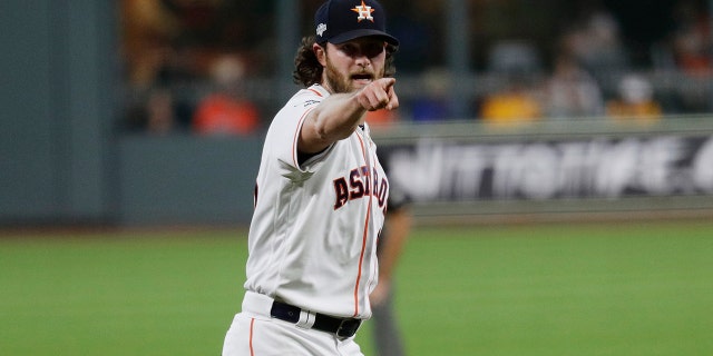 Houston Astros starting pitcher Gerrit Cole looks for a call against the Tampa Bay Rays during the first inning of Game 5 of a baseball American League Division Series in Houston, Thursday, Oct. 10, 2019. (AP Photo/Eric Gay)