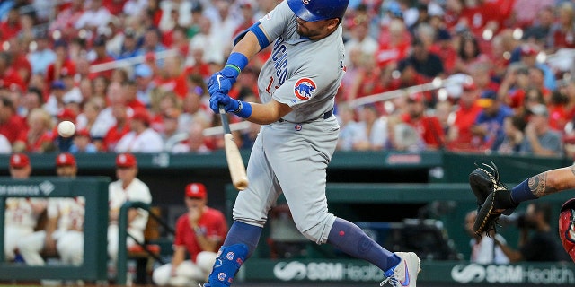 Chicago Cubs' Kyle Schwarber swings for a solo home run during the first inning of a baseball game against the St. Louis Cardinals, Saturday, Sept. 28, 2019, in St. Louis. (AP Photo/Scott Kane)