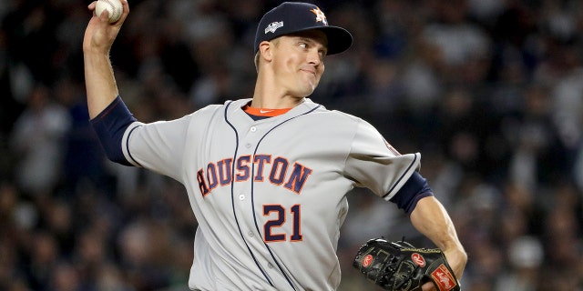 Houston Astros starting pitcher Zack Greinke (21) delivers against the New York Yankees during the first inning of Game 4 of baseball's American League Championship Series, Thursday, Oct. 17, 2019, in New York. (AP Photo/Frank Franklin II)