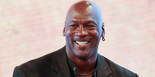 Michael Jordan attends a press conference for the celebration of the 30th anniversary of the Air Jordan shoe during the "Palais 23" interactive exhibition dedicated to Michael Jordan at Palais de Tokyo in Paris June 12, 2015. 