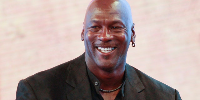 Michael Jordan attends a press conference for the 30th anniversary celebration of the Air Jordan sneaker during the "Palace 23" interactive exhibition dedicated to Michael Jordan at the Palais de Tokyo in Paris on June 12, 2015. 