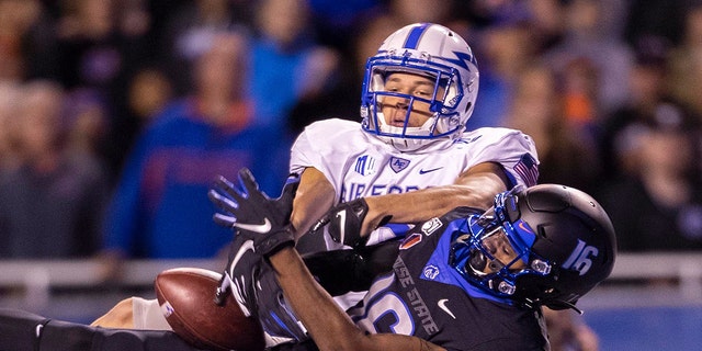 Boise State far-reaching receiver John Hightower tries to get control of a prolonged pass, though Air Force defensive behind Milton Bugg III, top, breaks adult a play on Friday, Sept. 20, 2019, during Albertsons Stadium in Boise, Idaho. The horde Broncos won, 30-19. (Darin Oswald/Idaho Statesman/Tribune News Service around Getty Images)