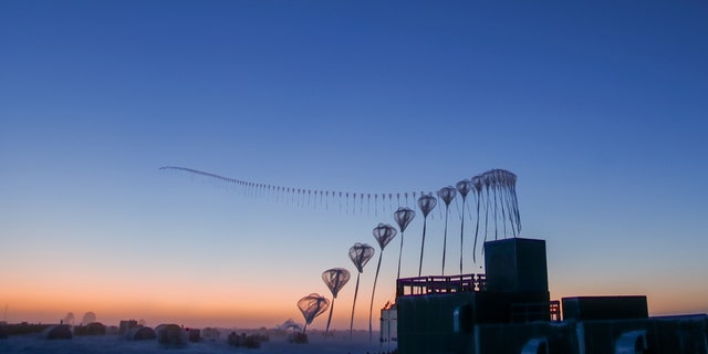 This time-lapse photo from Sept. 9, 2019, shows the flight path of an ozonesonde as it rises into the atmosphere over the South Pole from the Amundsen-Scott South Pole Station. Scientists release these balloon-borne sensors to measure the thickness of the protective ozone layer high up in the atmosphere. Credits: Robert Schwarz/University of Minnesota