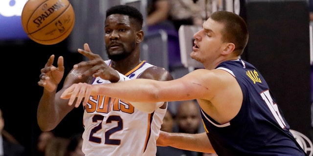 Deandre Ayton was a dominant player for Arizona before his NBA days. (AP Photo/Matt York)