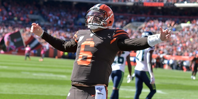 Cleveland Browns quarterback Baker Mayfield celebrates a touchdown during the first half of an NFL football game against the Seattle Seahawks, Sunday, Oct. 13, 2019, in Cleveland. (AP Photo/David Richard)