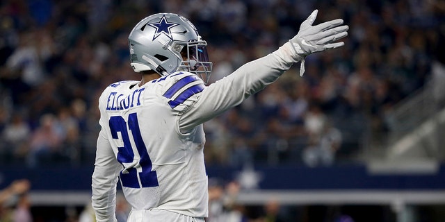 Dallas Cowboys' Ezekiel Elliott (21) celebrates running the ball for a first down against the Philadelphia Eagles in the first half of an NFL football game in Arlington, Texas, Sunday, Oct. 20, 2019. (AP Photo/Ron Jenkins)