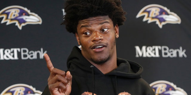 Baltimore Ravens quarterback Lamar Jackson meets with reporters after an overtime win over the Pittsburgh Steelers in an NFL football game in Pittsburgh, Sunday, Oct. 6, 2019. (AP Photo/Gene J. Puskar)