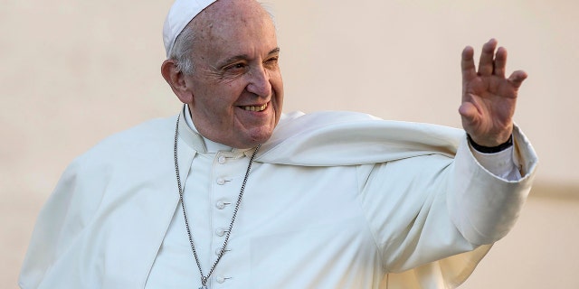 Pope Francis waves during his weekly general audience in St. Peter's Square at the Vatican, Wednesday, Oct. 9, 2019. (Fabio Frustcai/ANSA via AP)