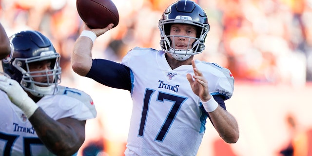 Tennessee Titans quarterback Ryan Tannehill throws a pass during the second half of an NFL football game against the Denver Broncos, Sunday, Oct. 13, 2019, in Denver. (AP Photo/Jack Dempsey)