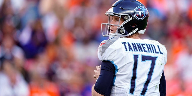 Tennessee Titans quarterback Ryan Tannehill looks to throw a pass during the second half of an NFL football game against the Denver Broncos, Sunday, Oct. 13, 2019, in Denver. (AP Photo/Jack Dempsey)