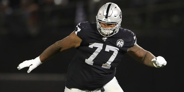 Oakland Raiders offensive tackle Trent Brown (77) protects a gap in the offensive line during an NFL football game against the Denver Broncos, in Oakland, Calif. (AP Photo/Peter Joneleit, File)