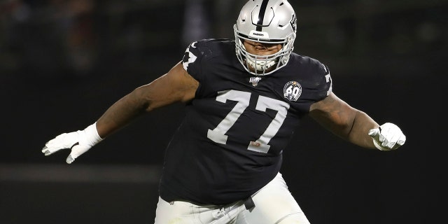 Oakland Raiders offensive tackle Trent Brown (77) protects a gap in the offensive line during an NFL football game against the Denver Broncos, in Oakland, Calif. (AP Photo/Peter Joneleit, File)