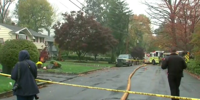 A small plane crashed into a home in Colonia, N.J. on Tuesday, sparking a blaze in two houses.