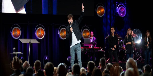 Joseph Prince, Singapore megachurch pastor and best-selling author, speaks during the first stop on his America tour.