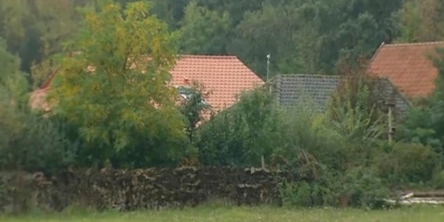 The small group of buildings after a family group were discovered to be living in secluded conditions in Ruinerwold, 80 miles northeast of Amsterdam, Netherlands, Tuesday Oct. 15, 2019.