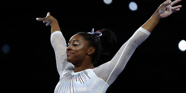 Simone Biles performs on the vault in the women's all-around final at the gymnastics world championships in Stuttgart, Germany, on Thursday.