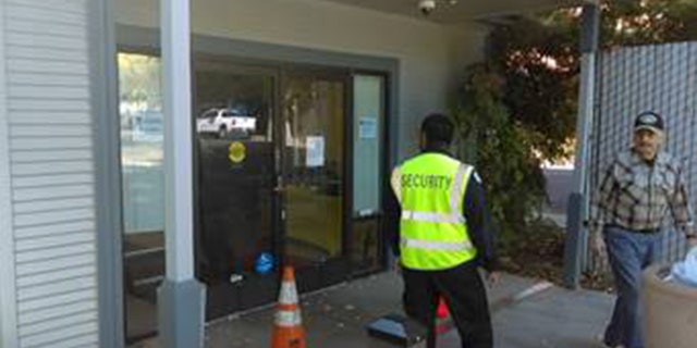 A security guard was posted outside the Pacific Gas and Electric office in Oroville, Calif. after an apparent act of vandalism on Wednesday.