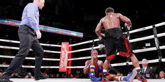 Conwell (black trunks) knocks out Day during a USBA Super-Welterweight boxing match at Wintrust Arena. (Jon Durr-USA TODAY Sports)